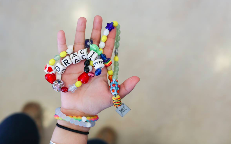 “These are my beads of courage. You get a yellow bead for an overnight stay. A white bead is for chemo. A black bead is when you get pricked. And I have two special heart-shaped beads because my heart stopped twice. The first time my heart stopped was late at night. It started beating really fast, and my nurse got very scared, and suddenly ten doctors ran in. They pulled out a big bag of ice and put it on my chest. I was a little annoyed because Justin Bieber was performing at the VMA’s and I had to turn down the volume. The doctors said, ‘Grace have you ever been on a roller coaster? This medicine is going to make you feel like you’re going down a giant hill!’ And they started putting those shock paddles on me. And I heard them tell my mom they were going to stop my heart, and she took out her Valium and started chewing it so it would work faster. Then somebody screamed, ‘Everyone clear!’ And my Mom said: ‘Are you ready Grace? It’s just a roller coaster! Are you ready?’ And then they pushed the shot into my IV and it felt like the world stopped spinning. The machine was going ‘beep, beep, beep,’ but then it stopped. And then nothing. And then nothing. And it felt like a giant boulder was dropped on my chest. And then suddenly my heart started beating again. And I yelled: ‘That did not feel like a roller coaster!’”