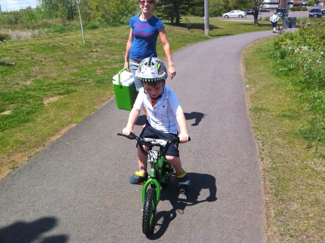 Cameron on his Bike